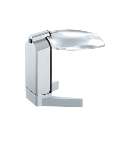 Scribolux, large rectangular lens suspended off of support base with LED light, displayed over crossword