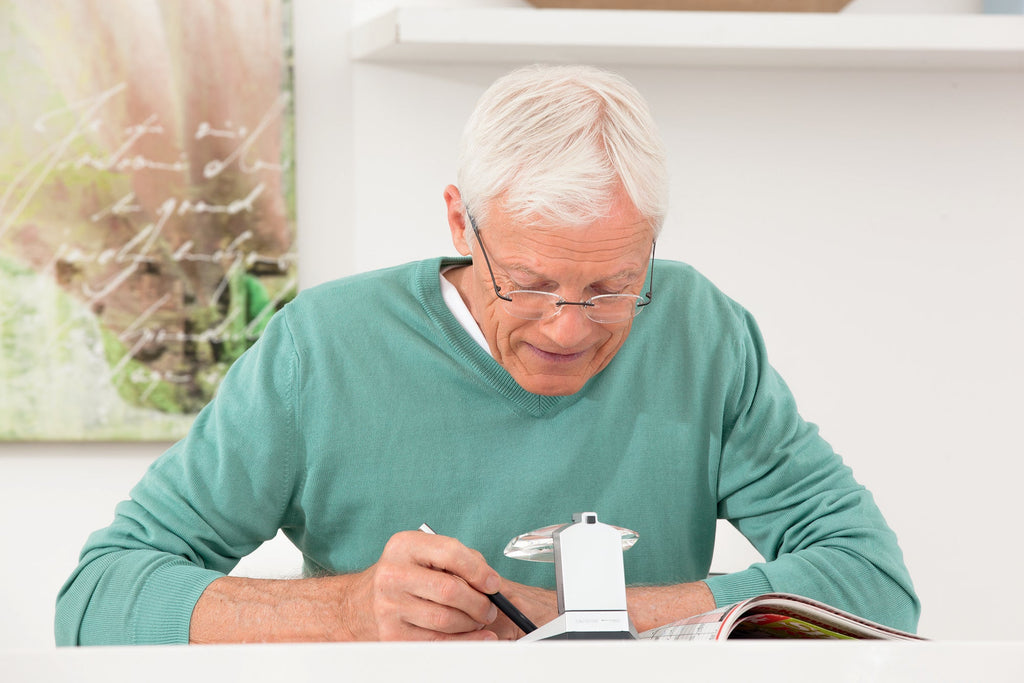 Man writing under Scribolux