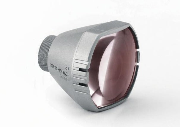 Galilean system with silver housing, Eschenbach logo on side of housing